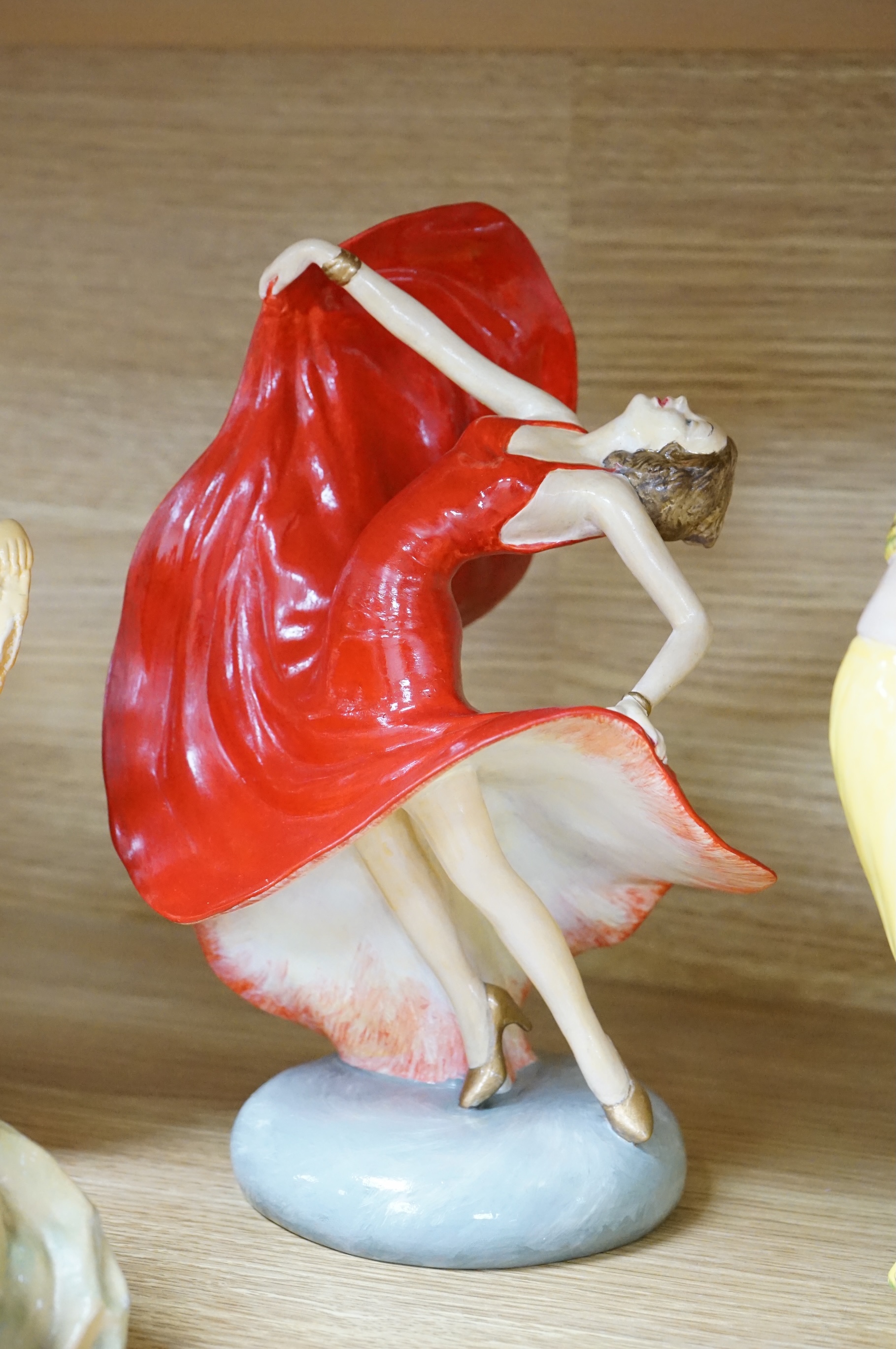 Nine Crown Devon 1930's dancers, in the manner of Wade figures, tallest 26cm high. Condition - fair to good